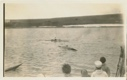 Image of Two kayaks-one capsizing